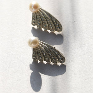 
                  
                    Pappilon Earrings
                  
                